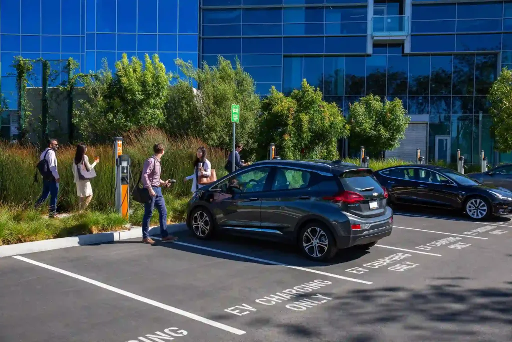 Electric vehicle charging at a workplace charging point